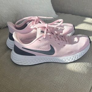 Light Pink Nike Revolution Sneakers